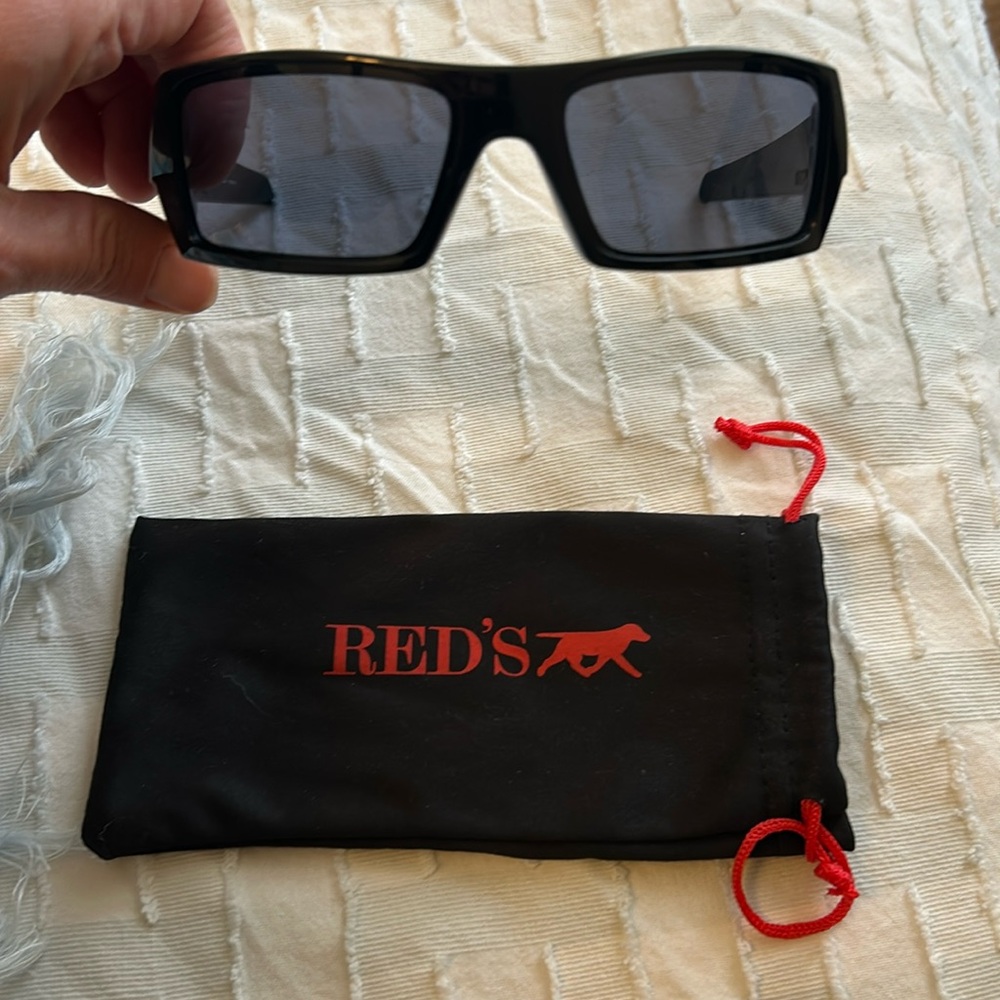Oakley unisex red sunglasses, pre-owned but never worn